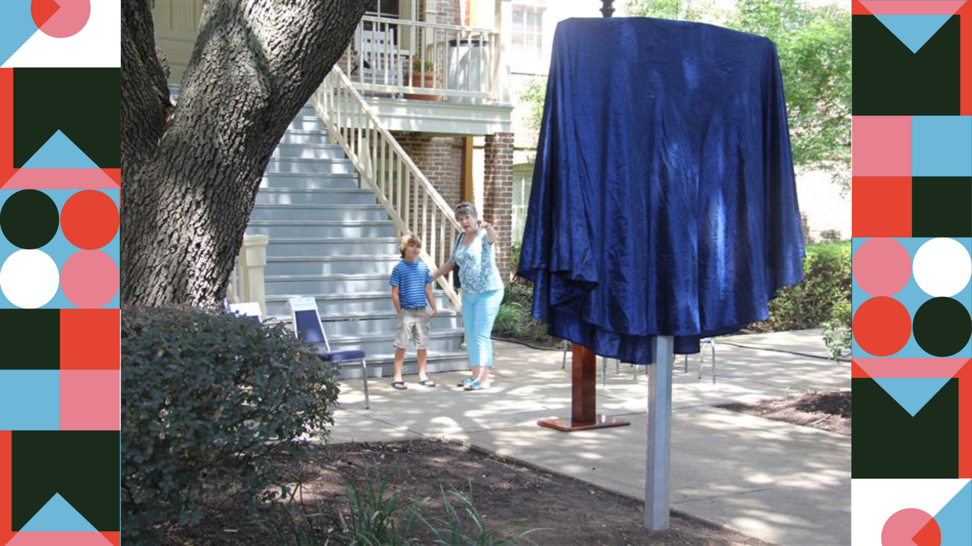 Image of a trail marker with a blue cloth over it.