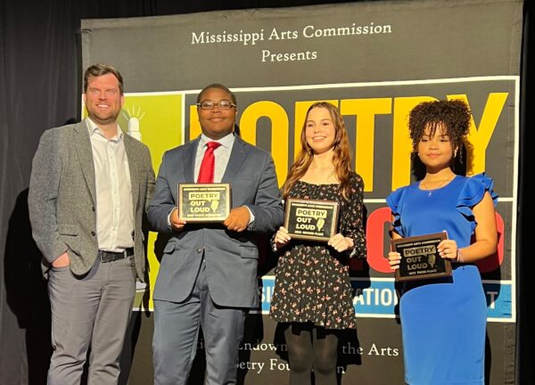 MAC Executive Director David Lewis and 2023 MS Poetry Out Loud Campion Edward Wilson first runner up Kalen Wallace and second runner up Melany Carrasco