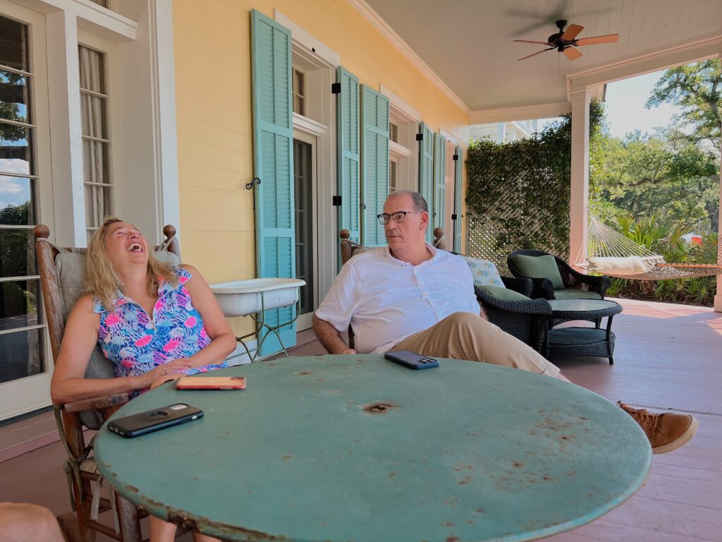 Margaret McMullin and Scott Naugle sitting on a porch