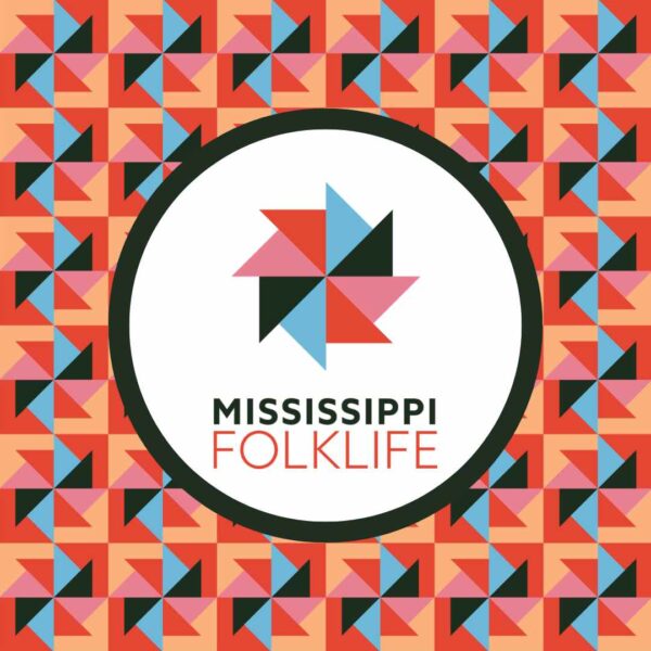 The Mississippi folklife pattern sits on a orange background with the logo stamped multiple times across and up and down with a white circle around the logo. The logo features a pinwheel with each triangle alternating colors between black, a redish orange, and a light blue color. The text below the pinwheel image says 'Mississippi' in a black color and 'Folklife' in a red color.